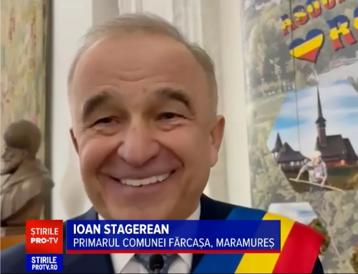 Primarul Ioan Stăgerean zâmbind la întâlnirea cu Ilie Bolojan.