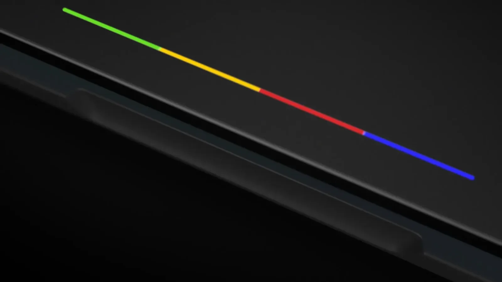 Detaliu al unui laptop Pixel cu lumini colorate pe margine.