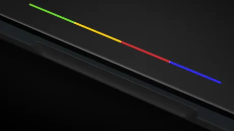 Detaliu al unui laptop Pixel cu lumini colorate pe margine.