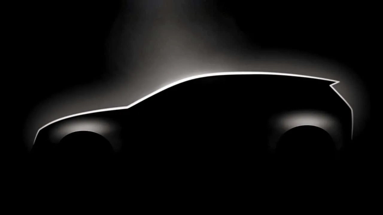 Silhouette a unui automobil electric, cu linii moderne și elegante.