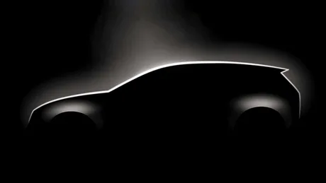 Silhouette a unui automobil electric, cu linii moderne și elegante.