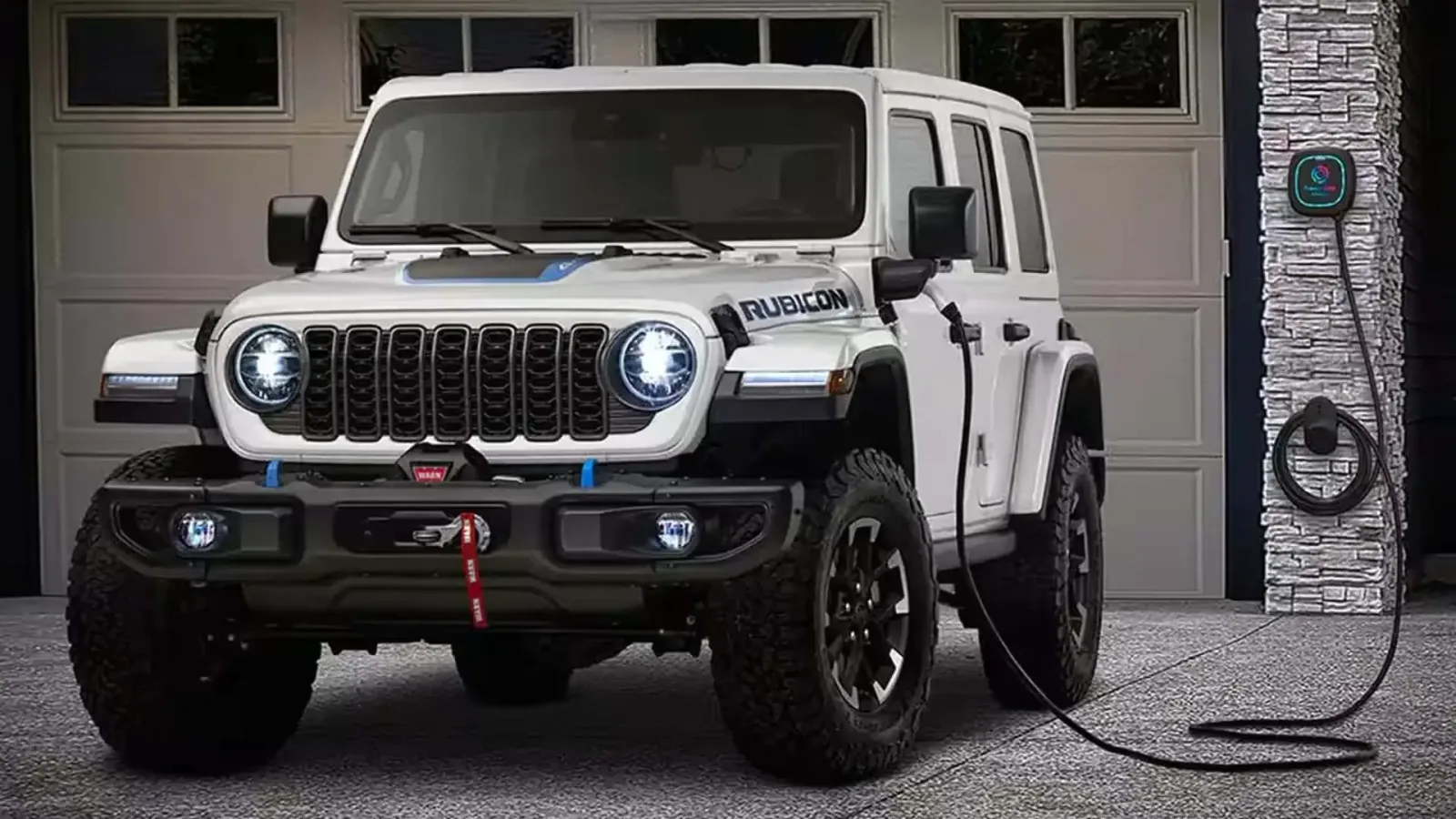 Jeep Wrangler 4xe conectat la o stație de încărcare în garaj.