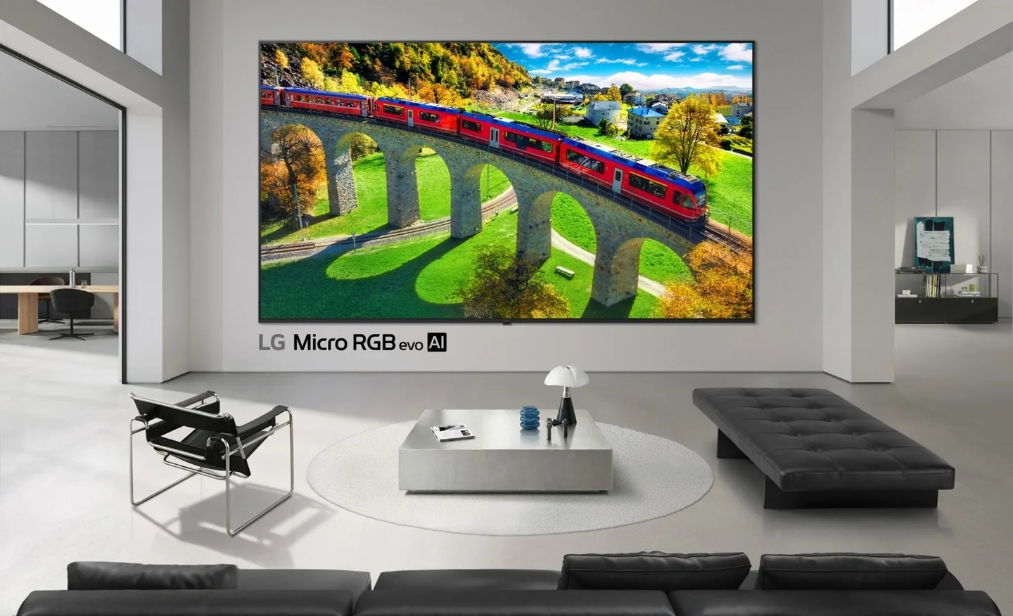 Un televizor LG modern expus într-un interior elegant, cu un peisaj vibrant pe ecran.
