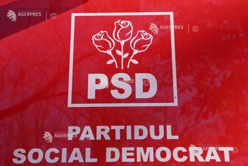 Logo-ul Partidului Social Democrat pe un fundal roșu.