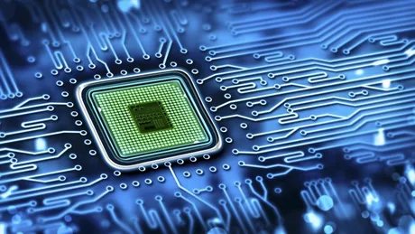 Cipuri electronice pe un circuit imprimat, simbolizând industria auto.