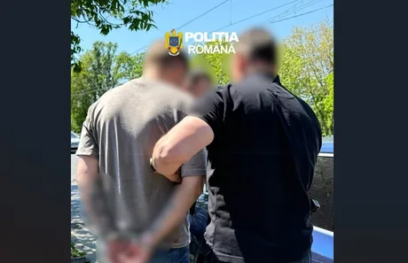Reținerea unui suspect de fraudă informatică în România.