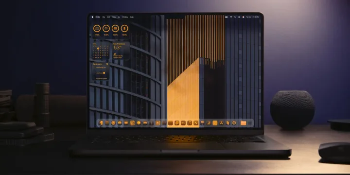 Ecranul unui laptop cu un design modern și culori calde.