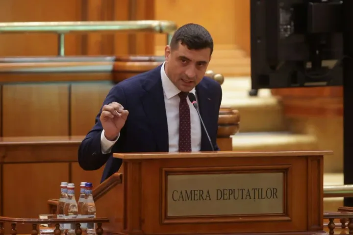 George Simion discutând despre libertatea presei în Parlament.