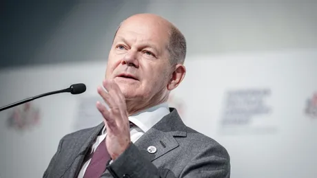 Ministrul german de interne discutând despre apărarea civilă.