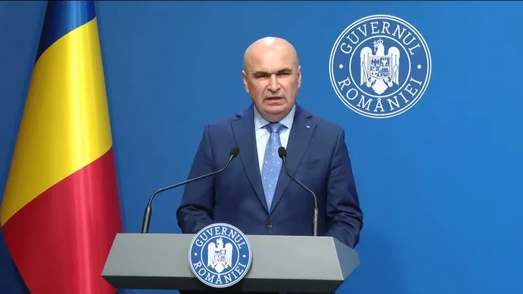 Ilie Bolojan discută despre investițiile în energie la o conferință de presă.