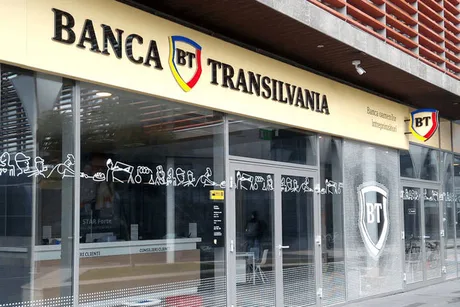 Sediul Băncii Transilvania, cu logo-ul vizibil și feronerie modernă.