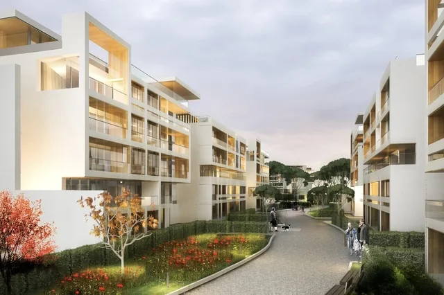 Complex rezidențial modern cu arhitectură contemporană și spații verzi.