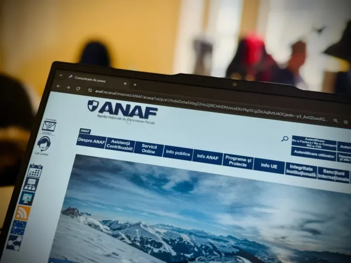 Pagina web ANAF deschisă pe un laptop, cu informații fiscale importante.