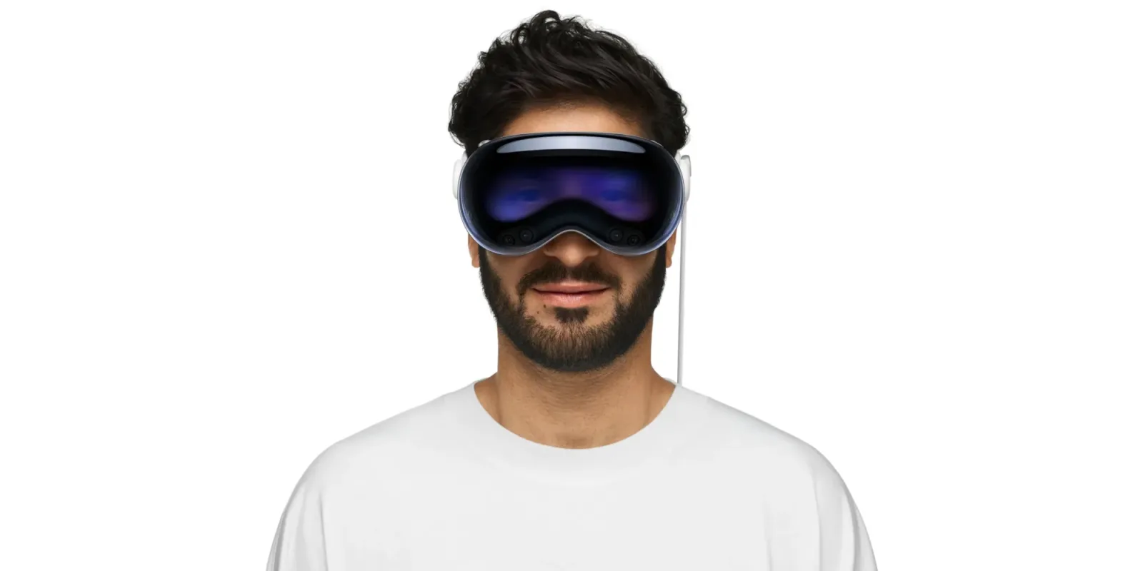 Utilizator purtând o cască Vision Pro, pregătit pentru actualizări viitoare.