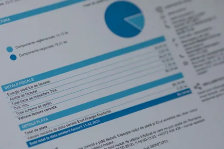 Factură de energie electrică cu detalii despre consum și prețuri.