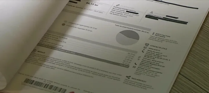 Factură de energie electrică cu detalii despre consum și costuri.