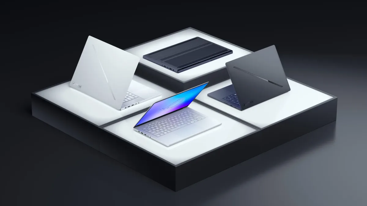 Laptopuri ASUS Zephyrus G14 și G16 pe un suport elegant.