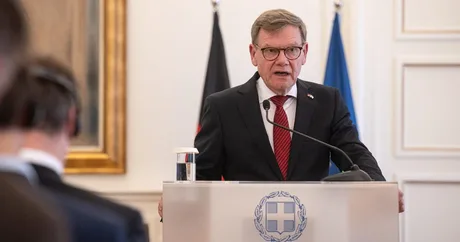 Ministrul german de externe discutând despre securitatea europeană.