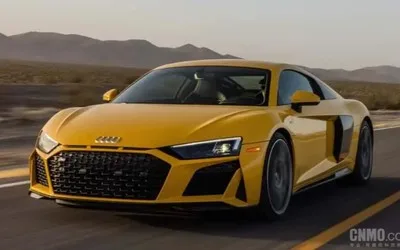 Audi R8 pe drum, simbol al performanței și inovației în automobile.