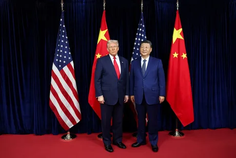 Donald Trump și Xi Jinping la Beijing, discutând despre comerț și Iran.