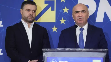 Ilie Bolojan și un coleg la o conferință PNL.