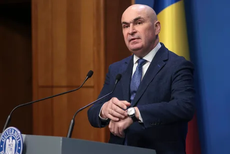 Reprezentant guvernamental discutând despre bugetul României și riscurile economice.