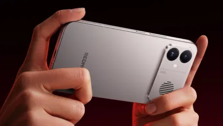 Un smartphone Redmi cu un design modern și o cameră duală pe spate.