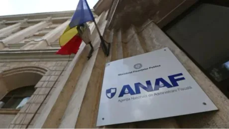 Sediul ANAF cu steagul României și sigla agenției vizibile.