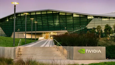 Clădire modernă cu logo Nvidia, simbol al tehnologiei avansate.