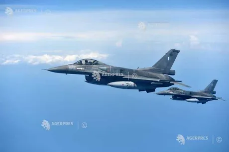 Avioane F-16 în zbor, simbolizând apărarea națională.