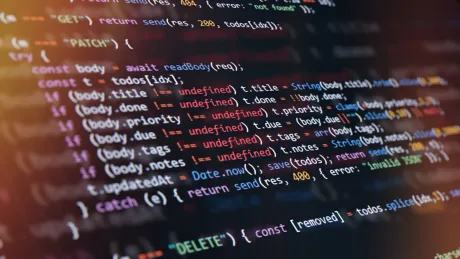 Cod sursă complex, evidențiind provocările dezvoltării software.