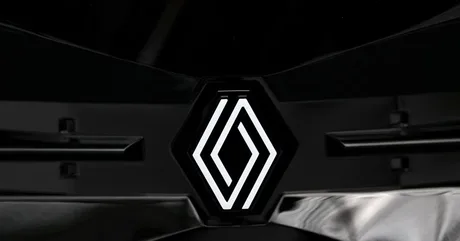 Logo-ul Renault pe fundal întunecat, simbolizând inovația și schimbarea.