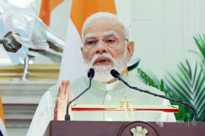 Narendra Modi discutând despre reducerea consumului de carburanți în India.