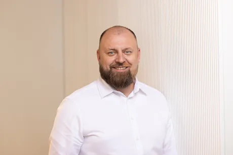 Mircea Munteanu, noul șef al vânzărilor Danone România, zâmbind.