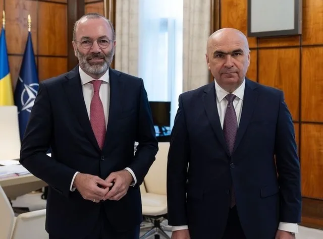 Manfred Weber și Ilie Bolojan discută despre reformele guvernamentale din România.